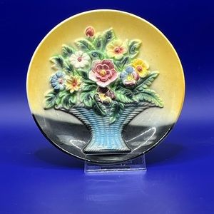 Vintage rare porcelain dish with raised flowers.